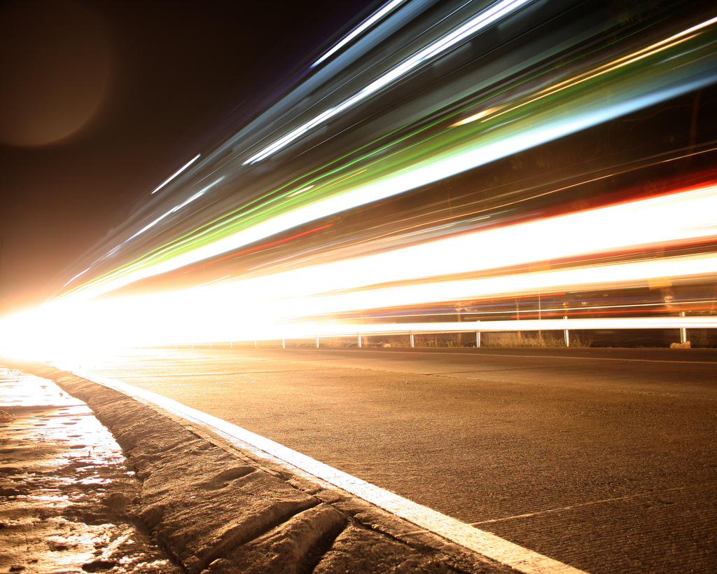 A photo of traffic moving so fast it is simply lines of light, Published as part of 