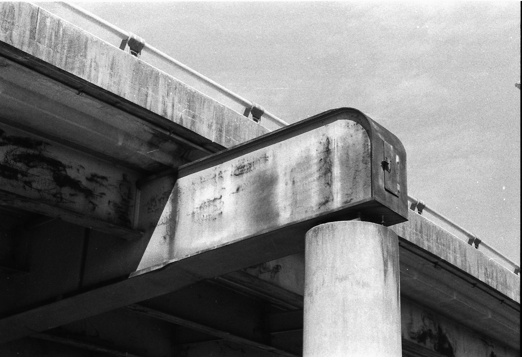 A strut supporting an overpass, published as part of 